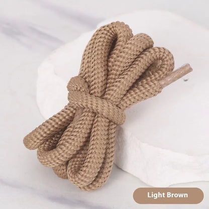 Round braided cotton shoelaces in multiple colours showing width and length options on a white background.