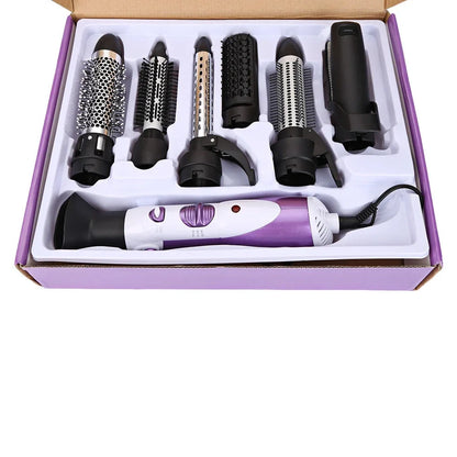 Purple folding hair dryer with diffuser attachment showing compact 20.5cm size