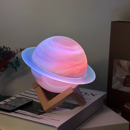 Rings of Saturn Dream Bluetooth Speaker showing 16.5cm dimensions with remote control and bracket accessories