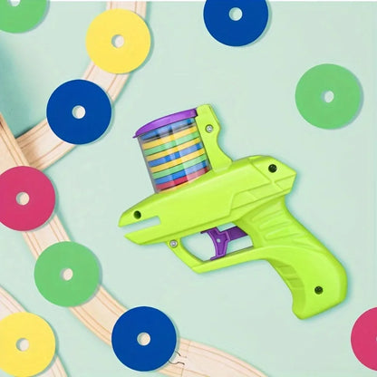 Green battery-free cat toy launcher with foam disc for interactive pet play
