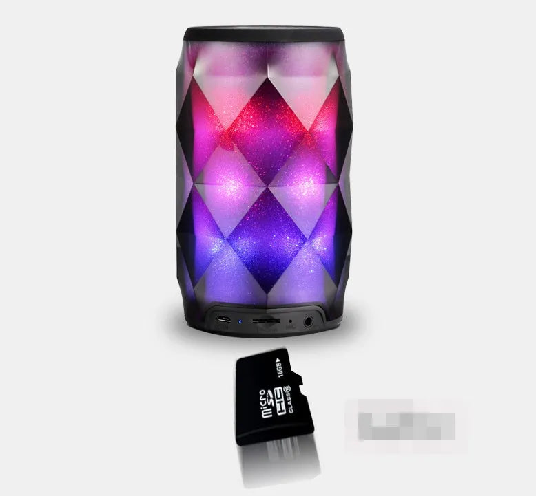 Black crystal diamond-cut Coke can shaped Bluetooth speaker with colourful starry sky LED lighting.