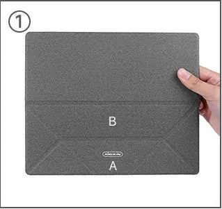 Blue or grey foldable laptop cooling stand with anti-slip surface on a desk.