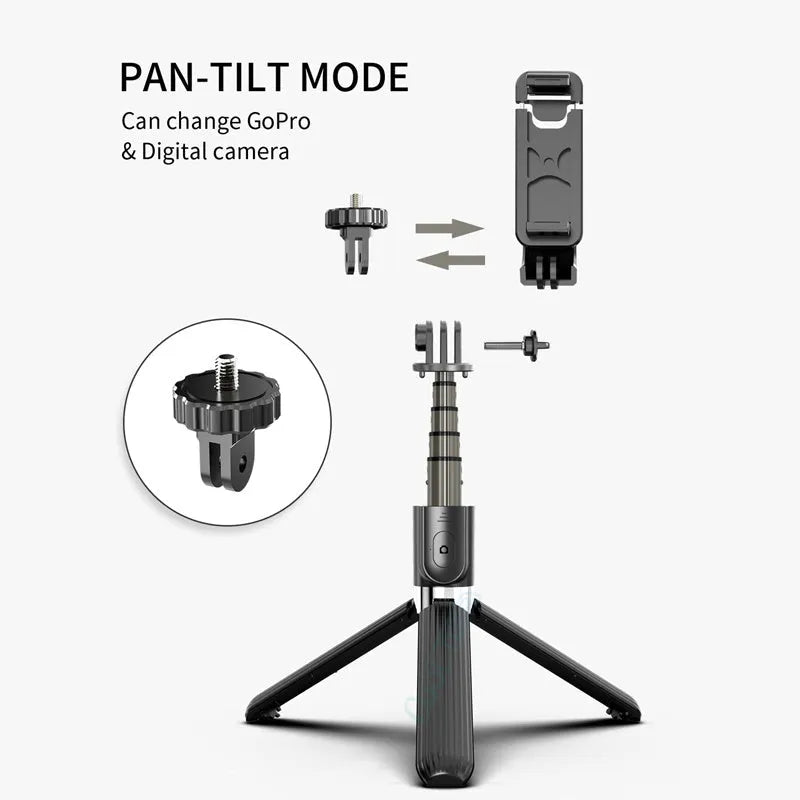 Black aluminium tripod selfie stick extended with iPhone attached showing length adjustment from 186mm to 700mm
