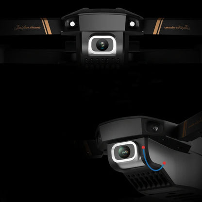 Black folding drone with 4K camera, protective frames, and remote control on grey background