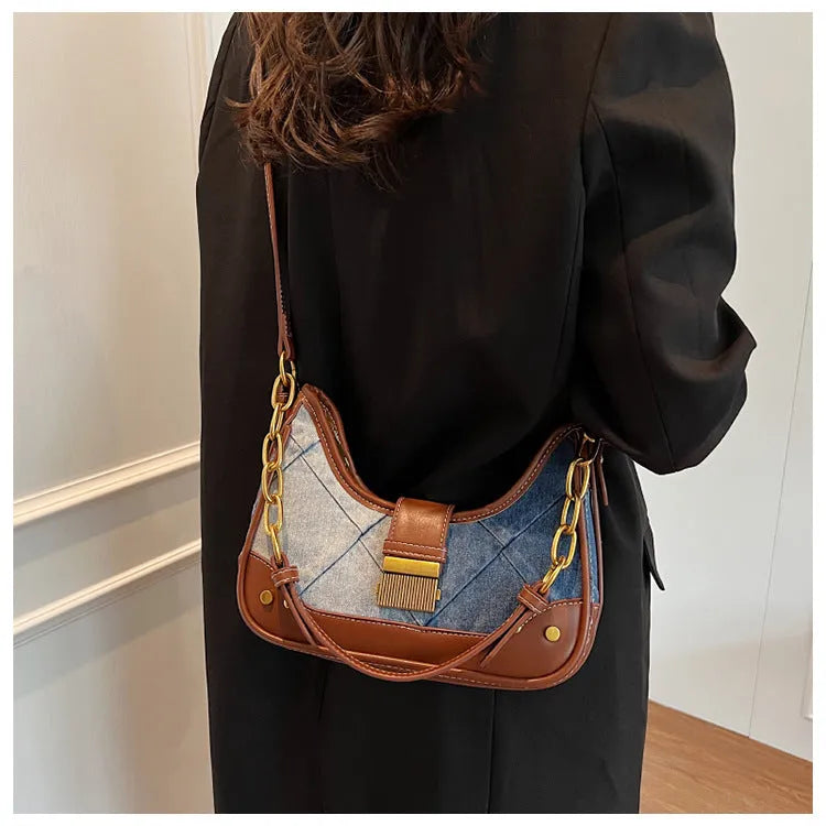 Brown denim women's bucket shoulder bag with diamond mesh detail and chain straps