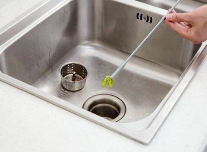 Stainless steel sewer dredge spring drain cleaning tool with a black PP handle.