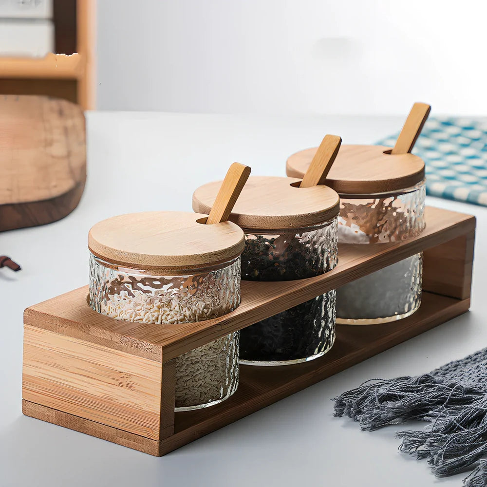 Japanese hammer pattern glass seasoning pot with three containers and bamboo lids on wooden base