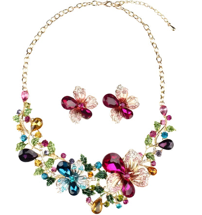 Crystal chain hair clip with gold-tone metal, crystal detailing, and exaggerated chain design for parties and weddings.