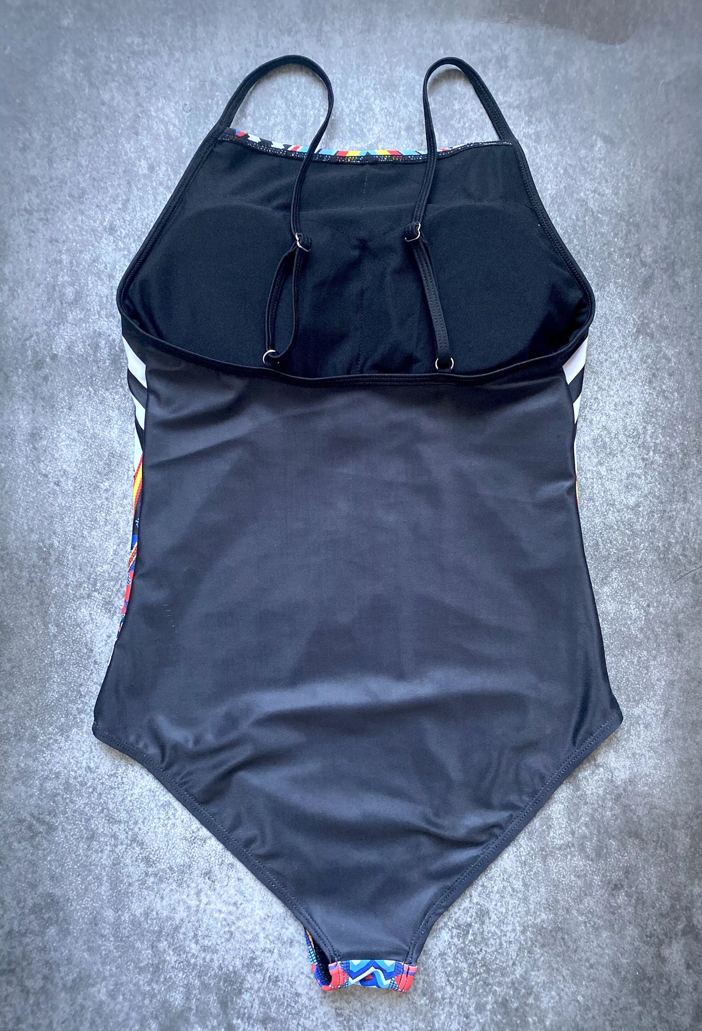 Black nylon one-piece triangle swimsuit with adjustable straps