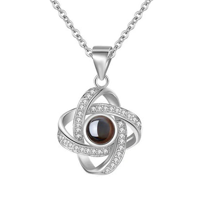 Four-leaf clover diamond necklace with hidden love words projection feature in S925 sterling silver