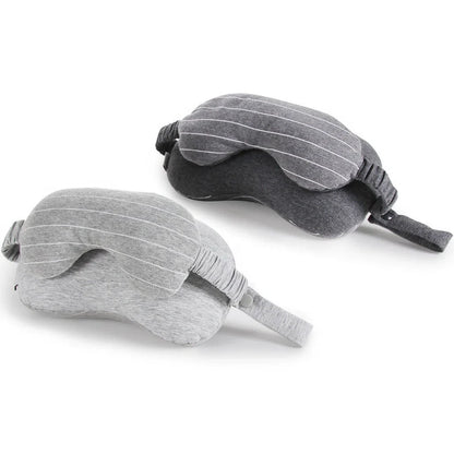 Dark grey two-in-one pillow showing neck support position and eye mask function with 24cm length measurement