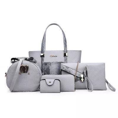 Women's stylish shoulder bag with zipper closure and multiple pockets in light gray, black, off-white, and rose red.