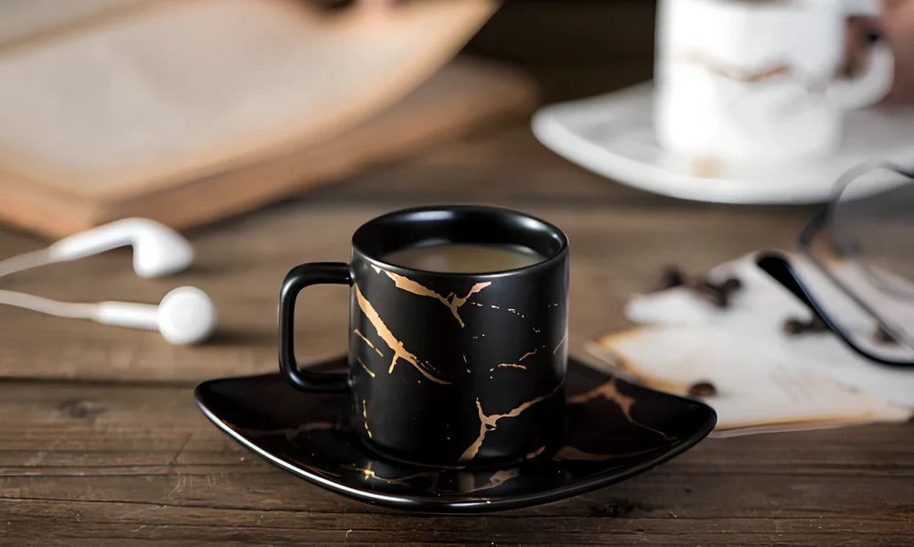 White ceramic coffee mug with double-wall construction showing cross-section insulation detail