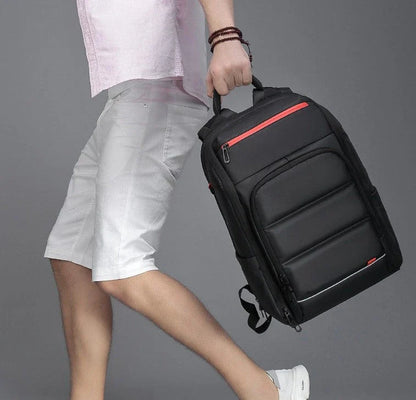 A sleek and versatile waterproof backpack with a USB charging port, perfect for the modern professional on the go.