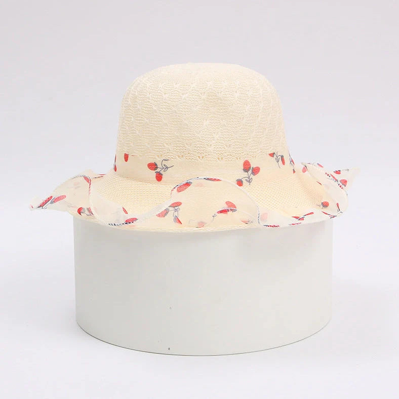 Children's princess straw hat with floral accents and wide brim for sun protection