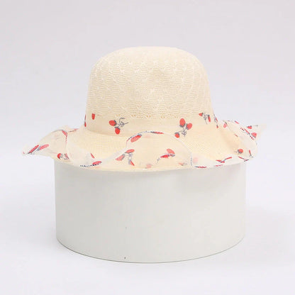 Children's princess straw hat with floral accents and wide brim for sun protection