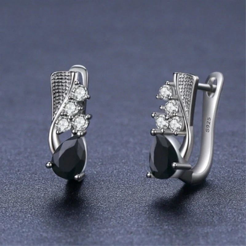 Elegant black drop-shaped rhinestone earrings for women, perfect for adding sparkle to any outfit.
