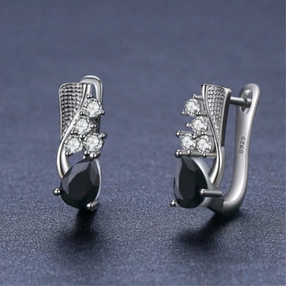 Elegant black drop-shaped rhinestone earrings for women, perfect for adding sparkle to any outfit.