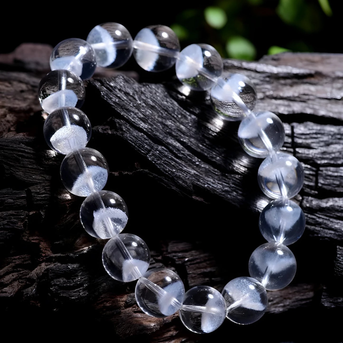 Women's original design bracelet with white crystal ghost pyramid beads and a ruyi decorative element.