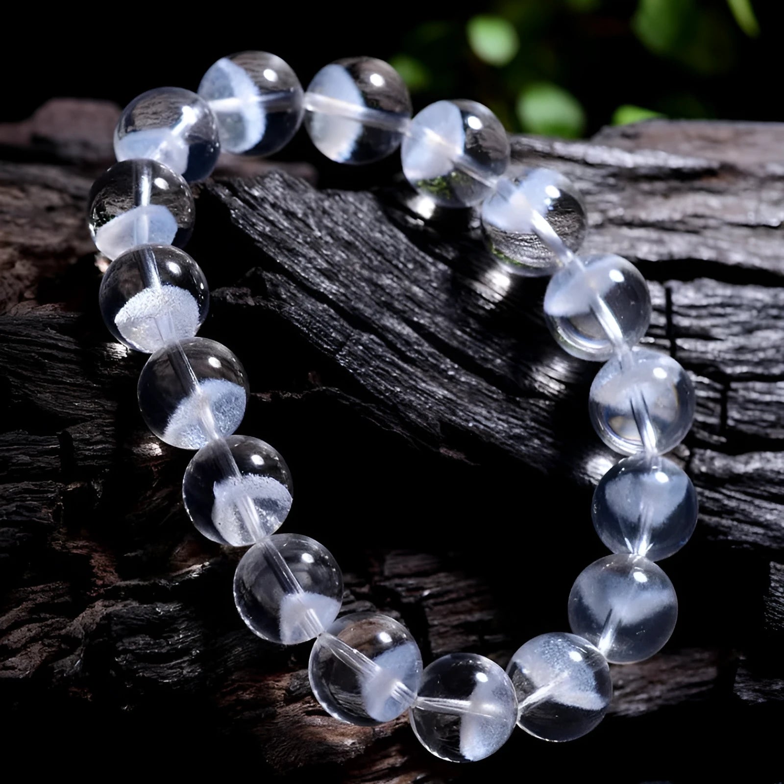 Women's original design bracelet with white crystal ghost pyramid beads and a ruyi decorative element.