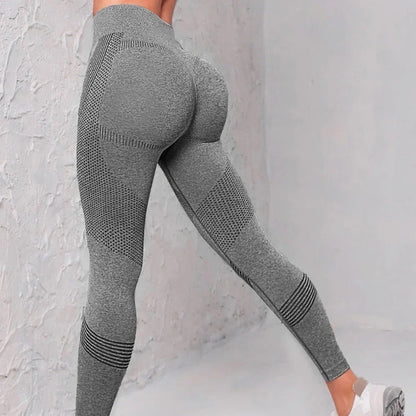 Women's high-waist seamless leggings in a variety of vibrant colors, featuring a curve-flattering design and breathable nylon fabric