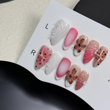 Hand-painted 3D embossed nail art patches in almond shape, showing candy and textured patterns.