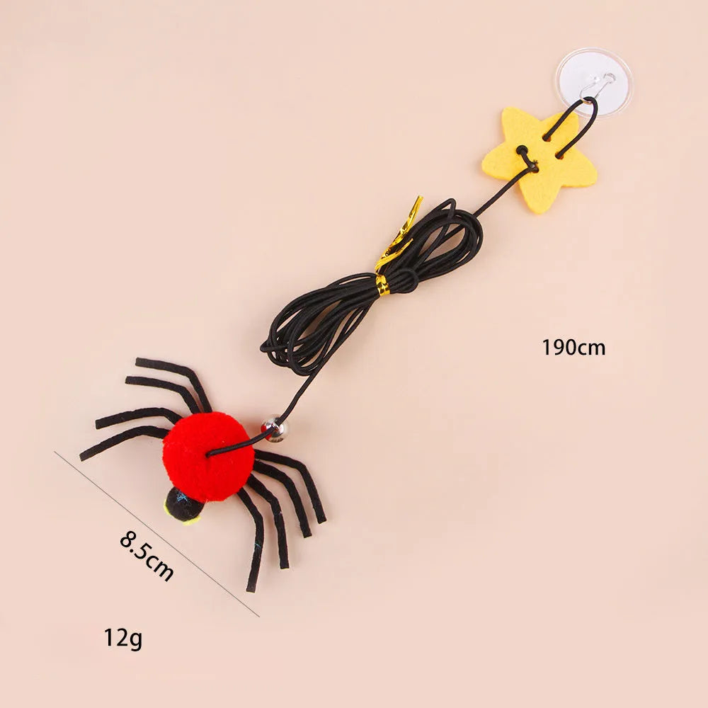 Cat toy hanging from door with elastic rope, colourful feather, bell and soft spider decoration