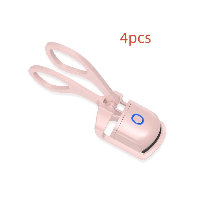 Pink heated electric eyelash curler with USB charging port and curved design with silicone pads