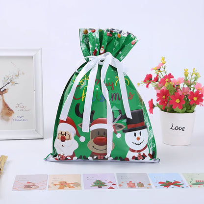 Christmas gift bag with drawstring closure in laser gold finish, 32x24cm dimensions