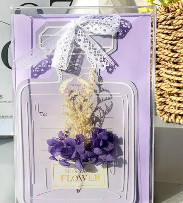 Handmade 3D pop-up greeting card with butterfly shape showing artificial flowers and hot stamping details