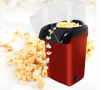 Red countertop popcorn machine with aluminium cooking surface and 1200W heating element