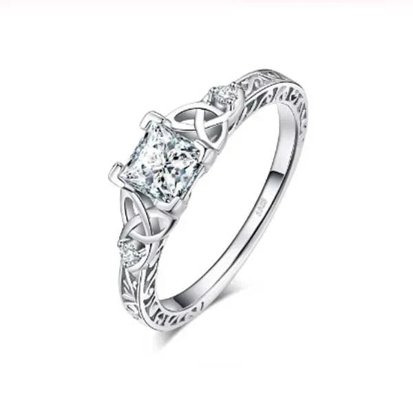 Elegant crystal engagement ring with constellation-inspired design and sparkling white steel accents