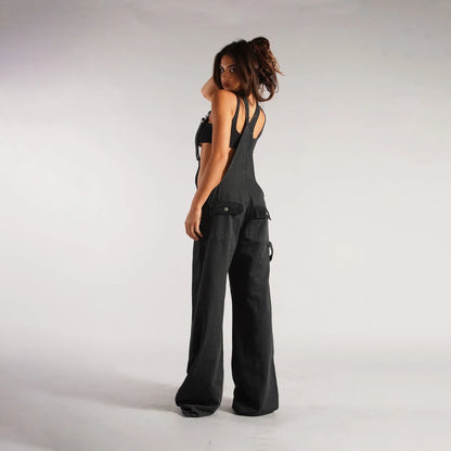 Fashionable Y2K-inspired denim overalls with pockets, suspenders, and a loose, comfortable fit