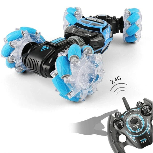 Red 4WD RC stunt car performing sideways drift with LED lights illuminated, showing gesture remote control