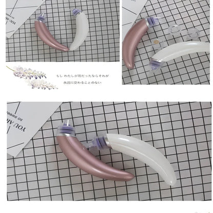 Electric blackhead suction instrument in rose gold and white colours for facial pore cleansing