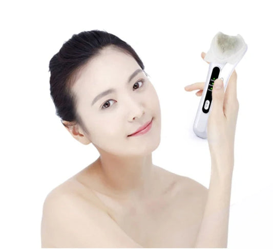 Electric Ultrasonic Facial Beauty Device in white, compact and portable design