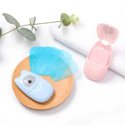 Pack of 50 pink biodegradable soap paper sheets, each 8x4.5cm, for portable hand cleaning on travels