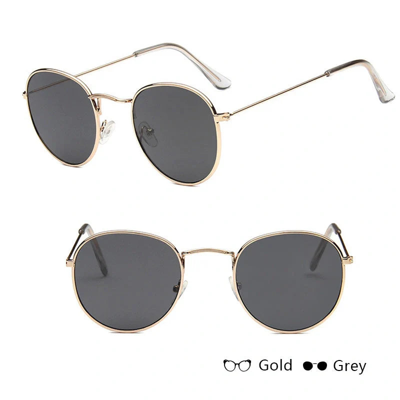 Stylish women's retro sunglasses with round frame and metal finish