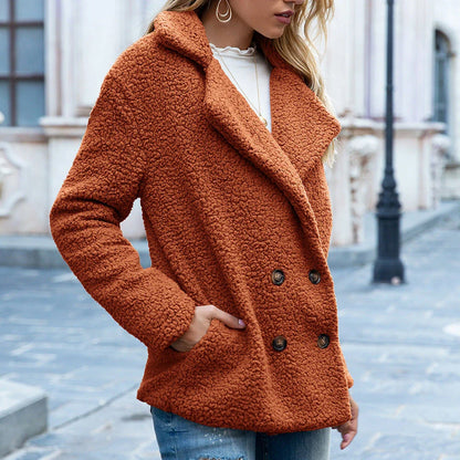 Cozy and stylish fluffy winter coat for women, made of premium polyester fiber for warmth and comfort.