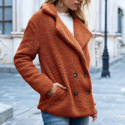 Women's fluffy polyester winter coat with loose lapel collar, shown in a choice of twelve colours.