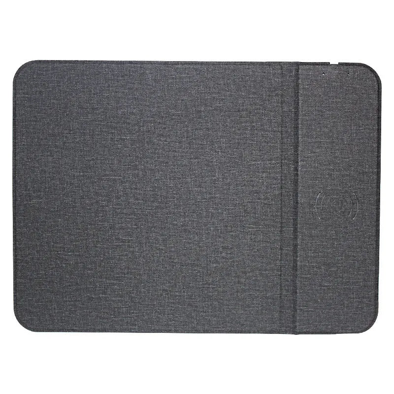 Foldable cloth wireless phone holder charging a smartphone, showing compact storage design