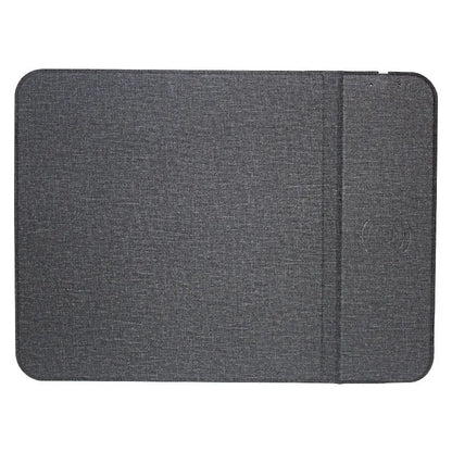 Foldable cloth wireless phone holder charging a smartphone, showing compact storage design