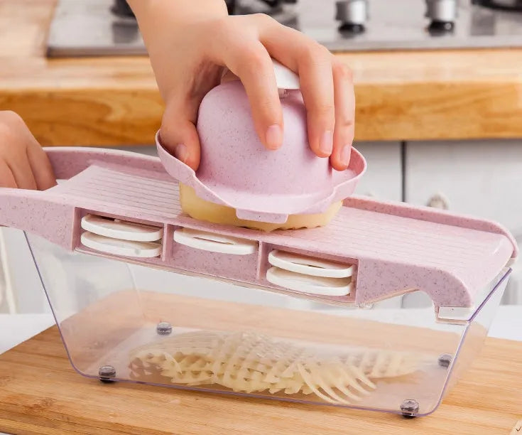 Multifunctional vegetable cutter with seven stainless steel blades on a food-grade plastic body.