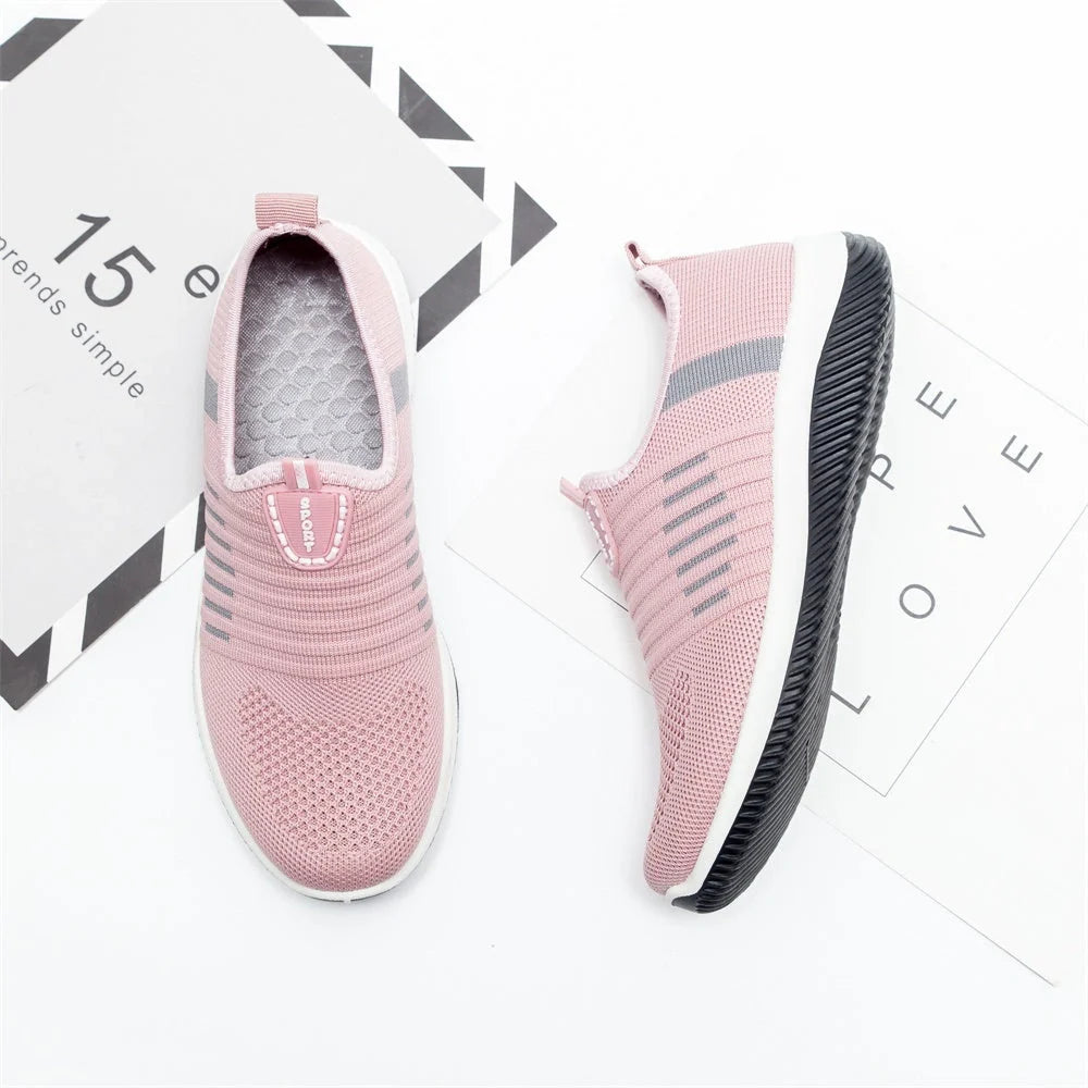 Women's summer breathable mesh shoes in red, black, and pink with flat heel