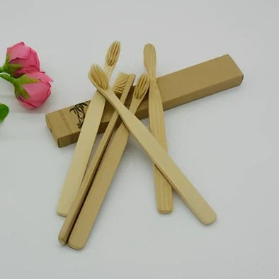 Organic bamboo toothbrush with 17.5cm ergonomic handle and charcoal-infused bristles for sustainable dental care