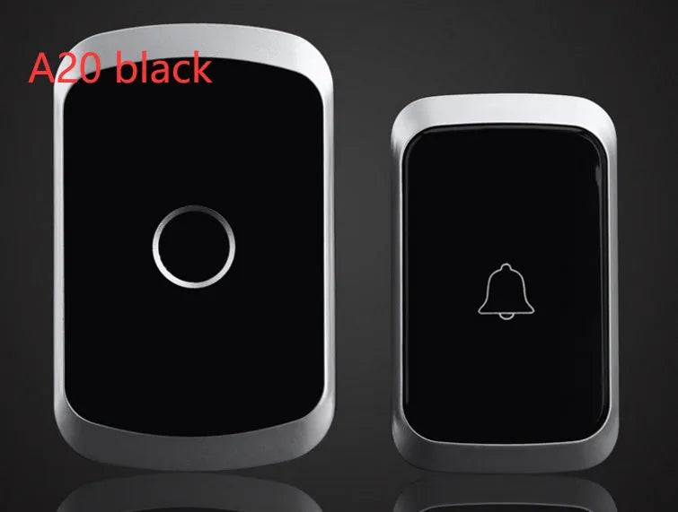White wireless plug-in doorbell chime and push button mounted on a door frame