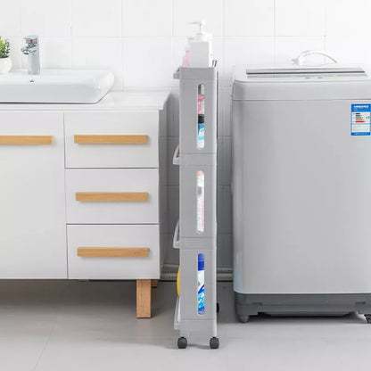 Wheeled kitchen storage rack in white and grey, offering space-saving organization with durable PP plastic construction.