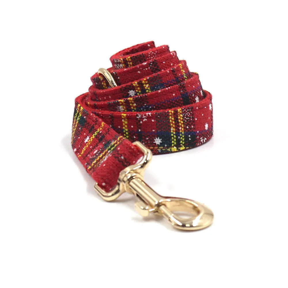 Red Christmas pet accessory set showing collar, traction rope, bowknot, harness and stool bag with laser design