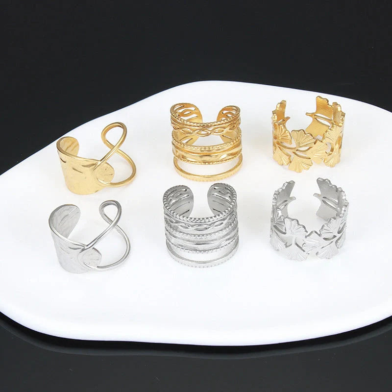 Adjustable stainless steel finger ring with unique charm designs in various colors