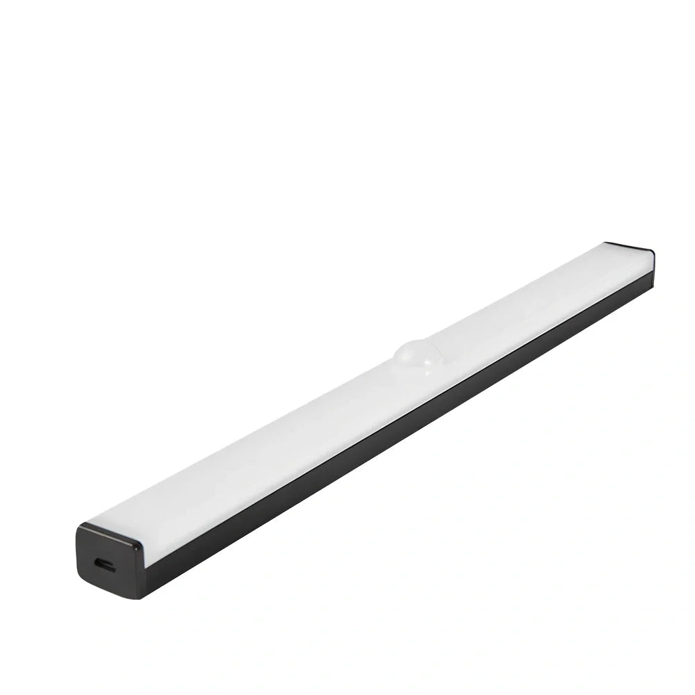LED strip light with motion sensor in black finish, 30cm length with warm white illumination
